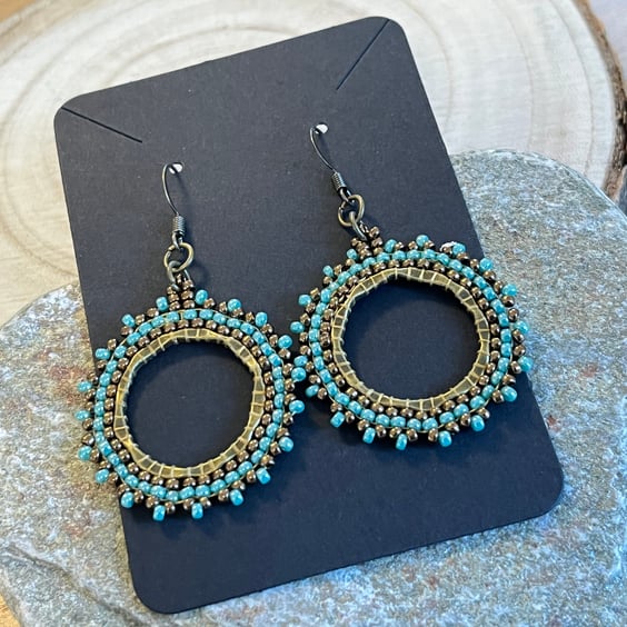 Beaded boho hoop earrings in bronze and blue