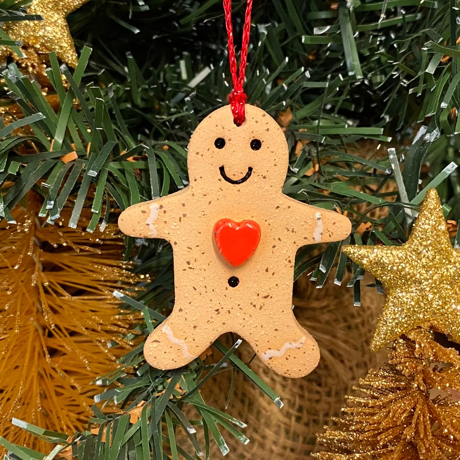 Small pottery gingerbread man with red heart