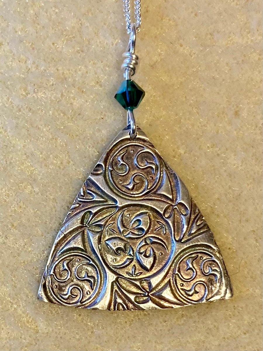 Triangular, silver necklace with Celtic style pattern & green Swarovski bead 