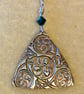 Triangular, silver necklace with Celtic style pattern & green Swarovski bead  - Image 1