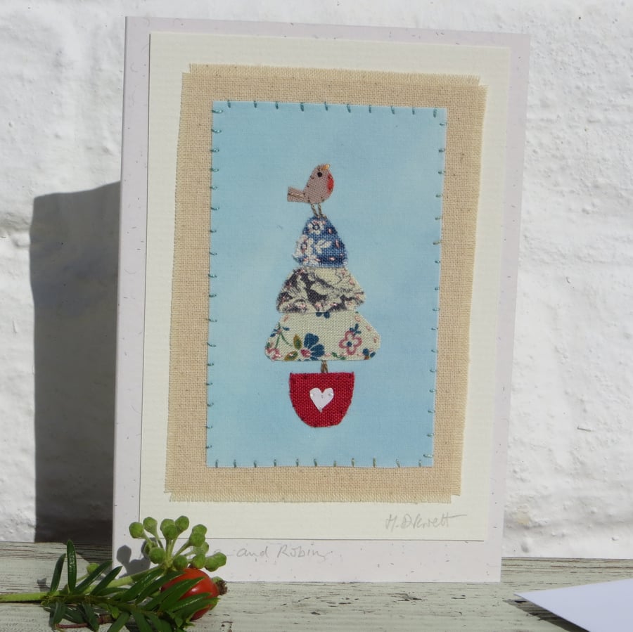 Little Tree, hand-stitched miniature textile on card with robin at the top