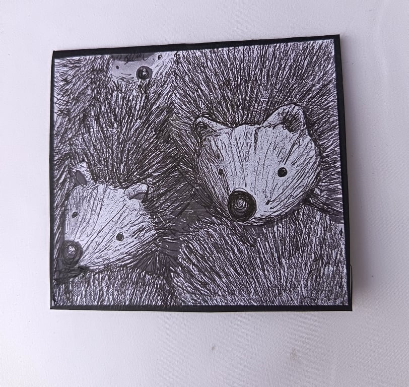 Hedgehog card: a family of hedgehogs in pen and ink 