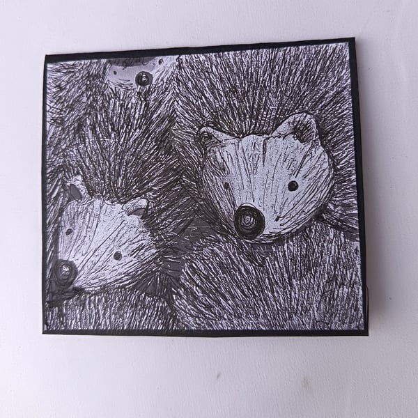 Hedgehog card: a family of hedgehogs in pen and ink 