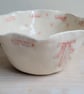 Ceramic bowl wth pink dots spots and ribbon handmade fluted scalloped dish.  - Image 1