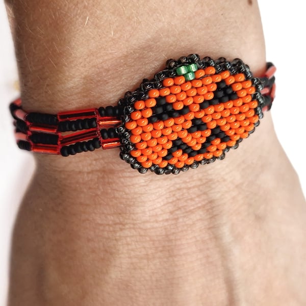 Orange and black evil and happy beaded pumpkin beaded halloween bracelet
