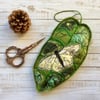 Embroidered leaf with butterfly home decoration. 