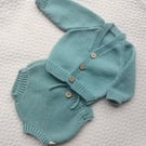 Hand knitted baby first cardigan