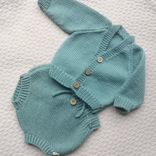 Hand knitted baby first cardigan