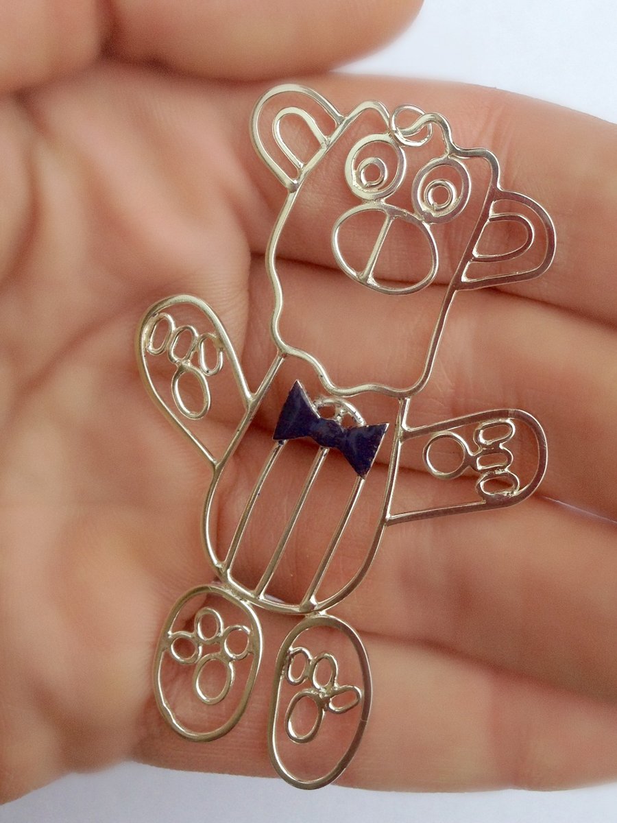 A bespoke sterling silver pendant from a childs drawing. perfect for Mum.