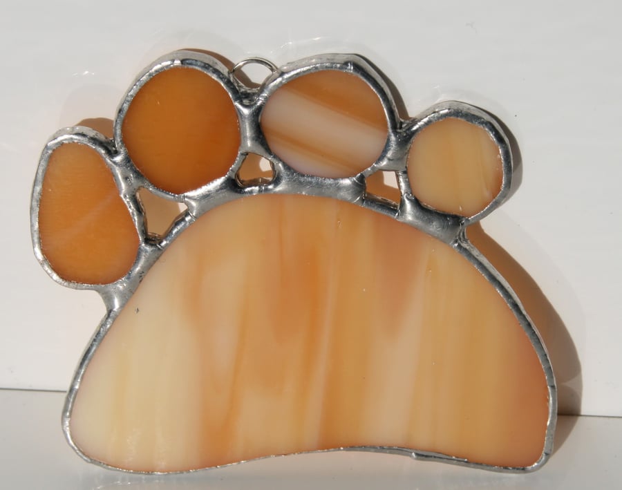 Handmade stained glass hanging dog paw print