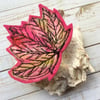 Stunning embroidered leaf brooch.