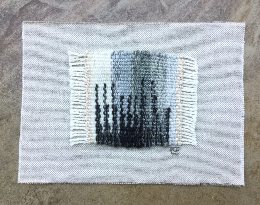 Unframed handwoven tapestry weaving, textile art in black, grey and cream