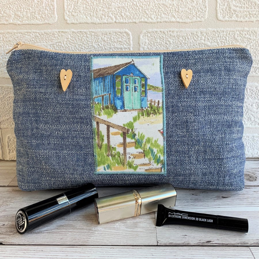 Large blue make up bag with beach hut decorative panel