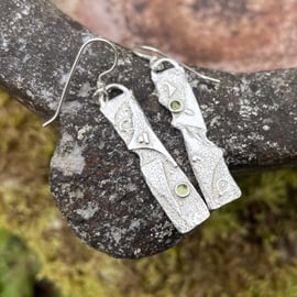 Silver and peridot mismatched earrings