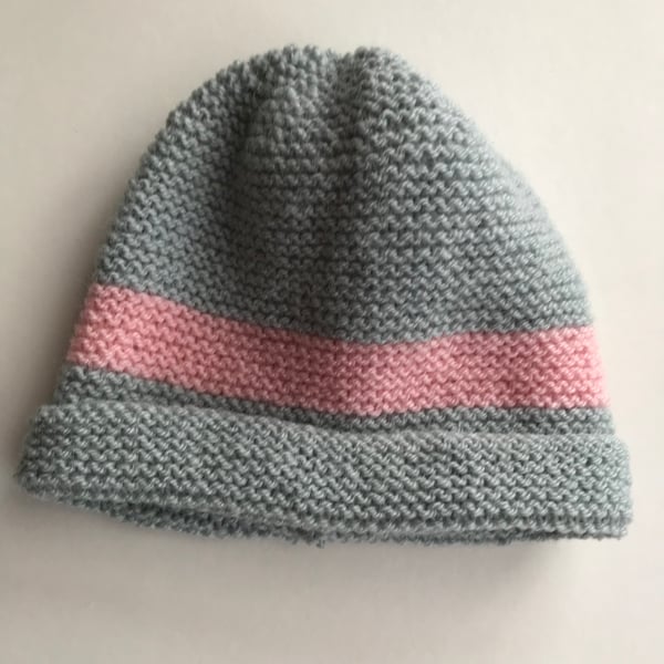 Grey hand knitted hat with a pink stripe