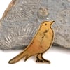 Golden bird brooch