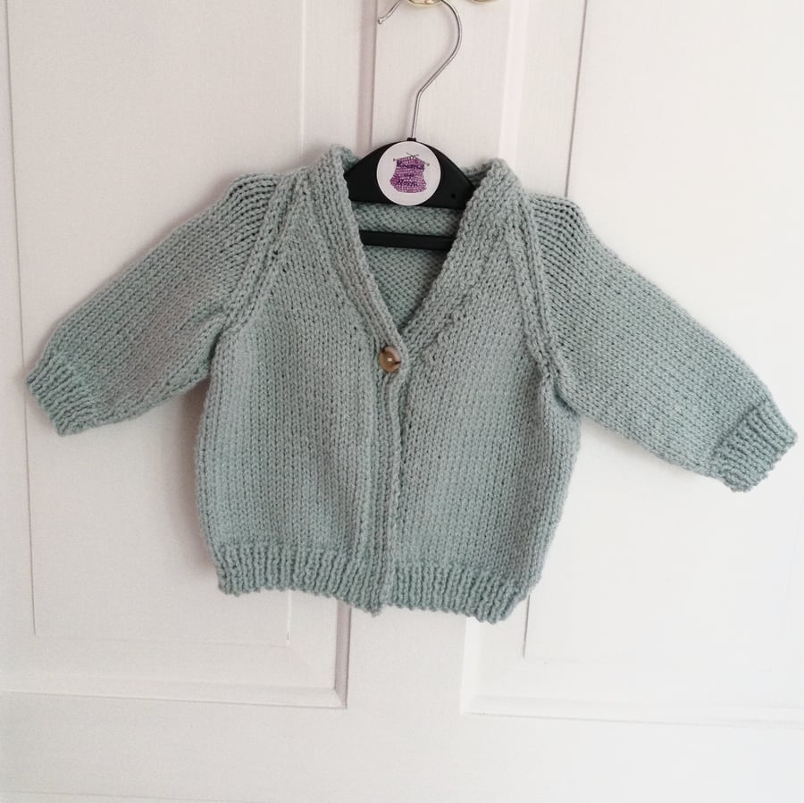 SALE Hand-knitted baby cardigan in pale blue
