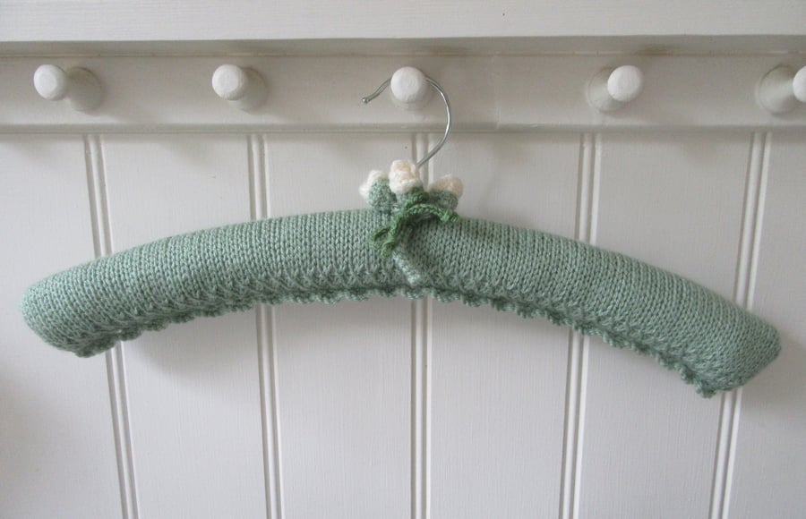 Ladies padded green coat hanger with rose buds