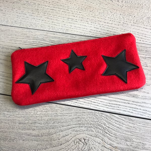 Red Felt Clutch Bag with Black Faux Leather Star Decoration.