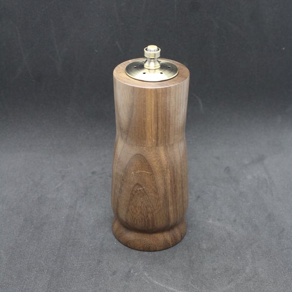 Handcrafted, salt shaker and pepper grinder, all-in-one, made from Black America