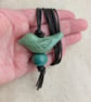 Green ceramic bird pendant on dark brown leather cord - Image 6