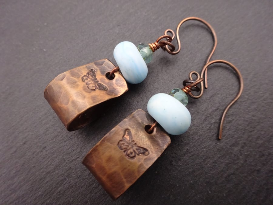 copper butterfly earrings, blue lampwork glass