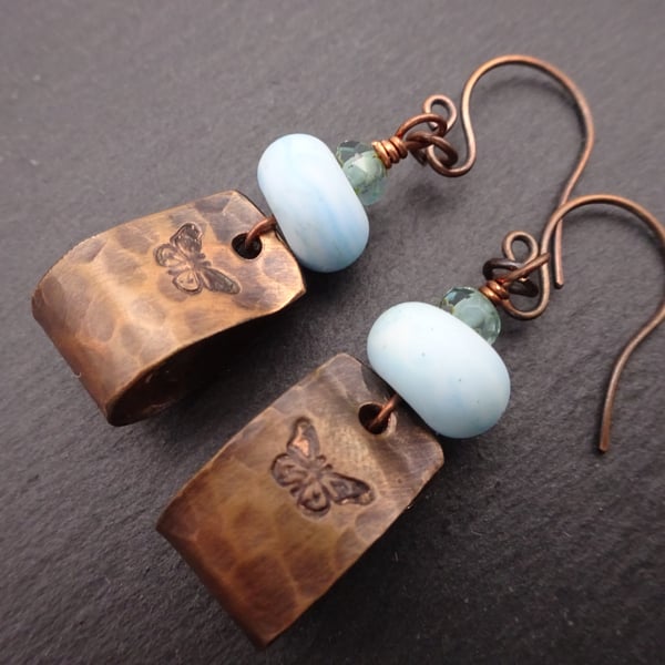 copper butterfly earrings, blue lampwork glass