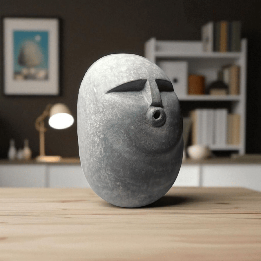 Stone Face Ooof Sculpture,  Hand carved into Limestone pebble