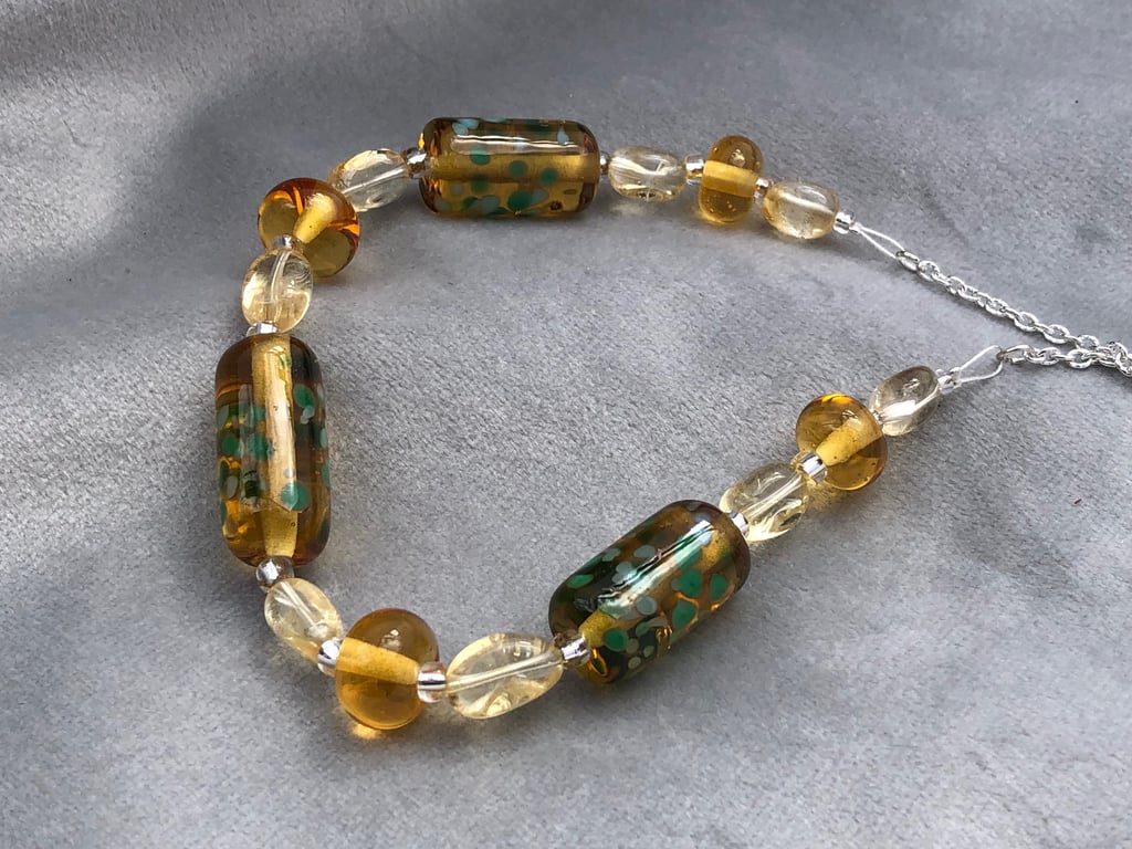 amber and green coloured lampwork glass beaded necklace with citrine stones