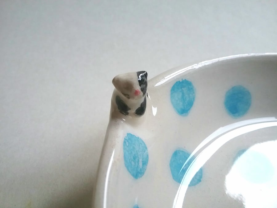 Hand made small spotty ceramic cat bowl with tiny cat and fish
