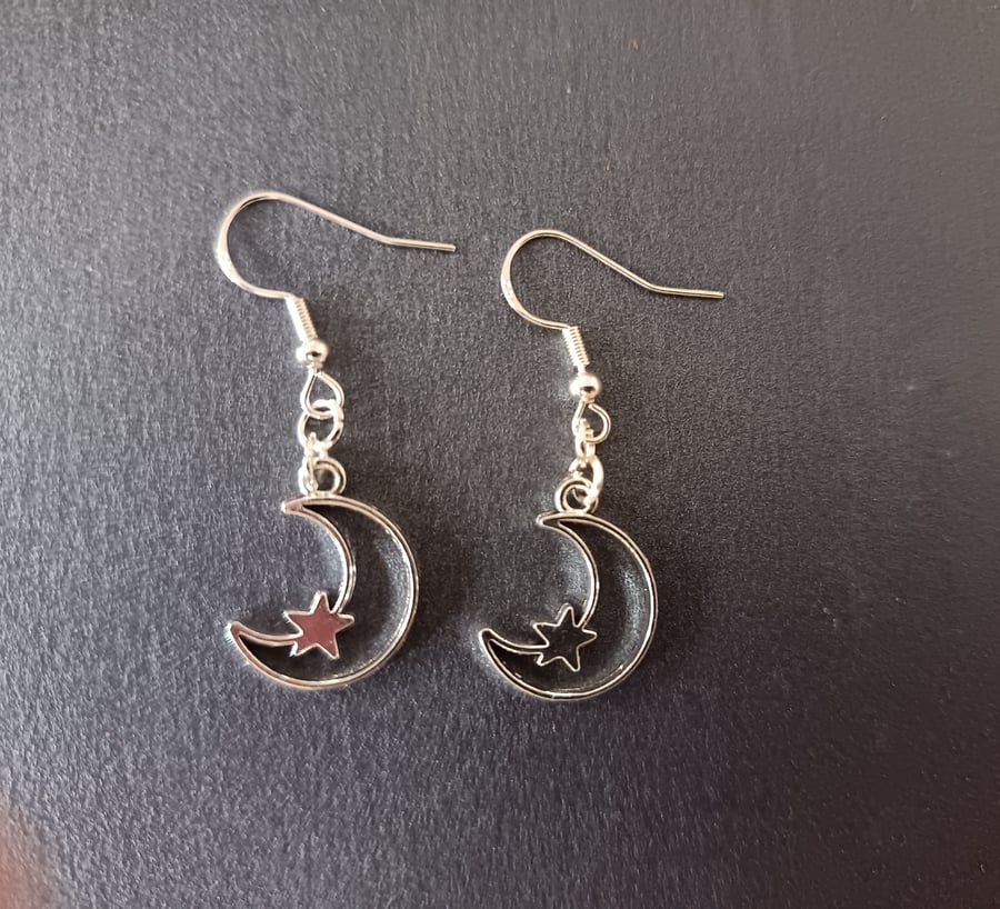 Handmade silver moon and star dangle earrings 