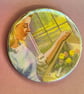 Holographic vintage book pin badge - ladybird woman painting flowers - Image 1