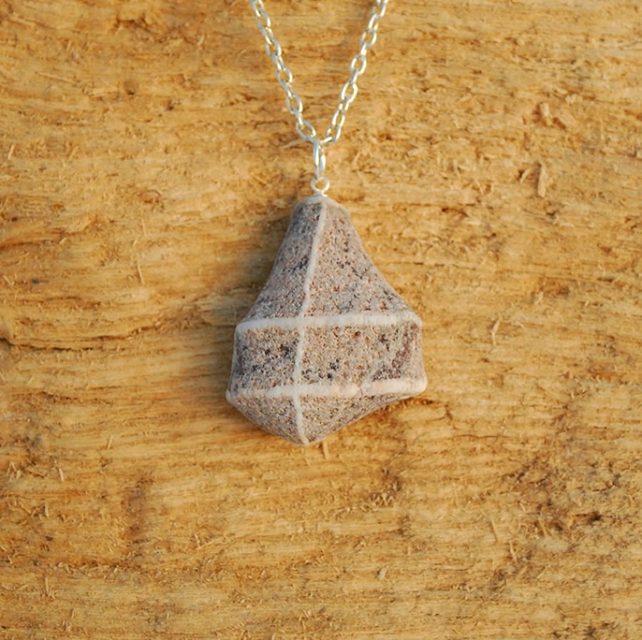 Unusual shaped pebble pendant