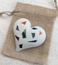 Handmade heart brooch crafted from smooth jesmonite and colour aluminium pieces