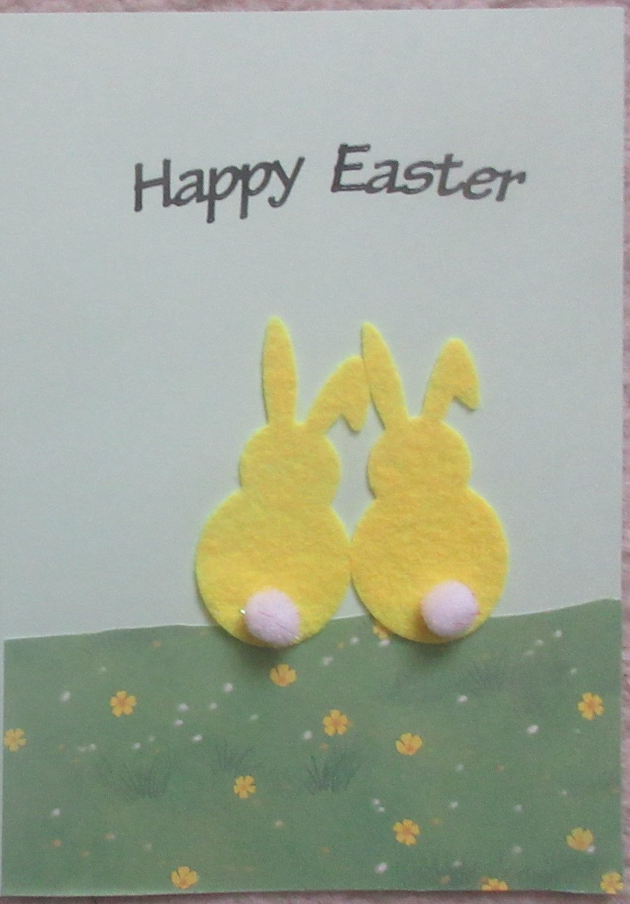 Easter Greeting Card - Two felt yellow bunnies sitting on a hill of buttercups