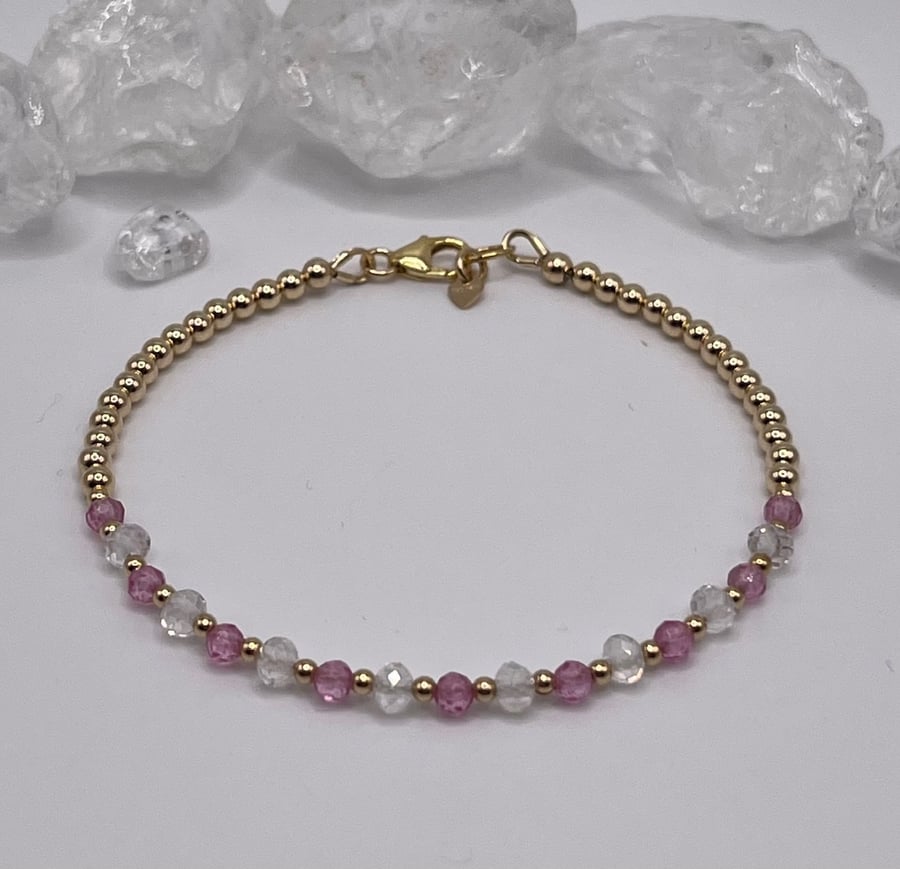 Gold bracelet with pink sapphires and quartz crystals 