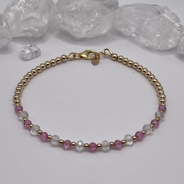 Gold bracelet with pink sapphires and quartz crystals 