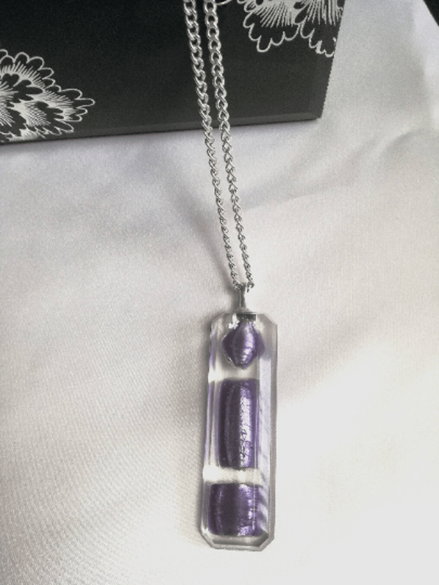 Handmade resin necklace with large purple glass beads