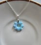 Polymer flower necklace on a silver plated chain