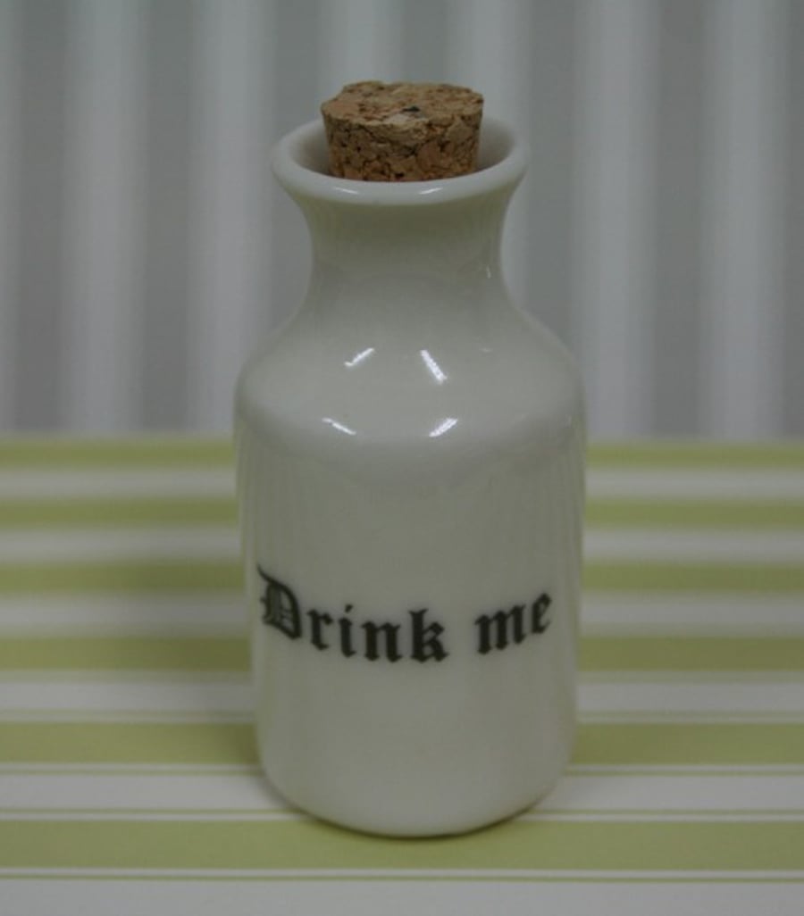 Small porcelain bottle with drink me wording
