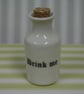 Small porcelain bottle with drink me wording - Image 1