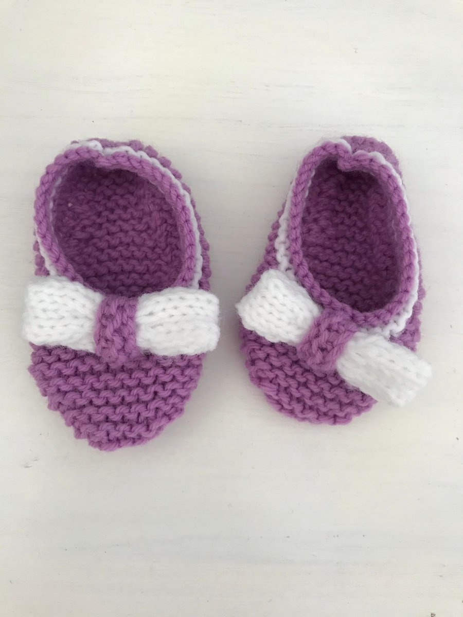 Purple shoes with bows