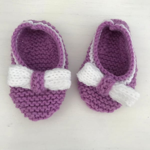 Purple shoes with bows