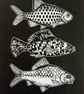 Linocut print of Three Little Fish handprinted in black - Image 2