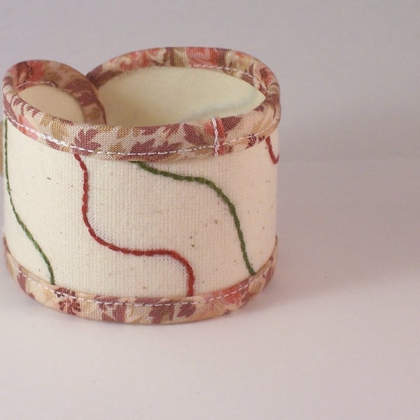 Hand embroidered fabric cuff - Lay lines