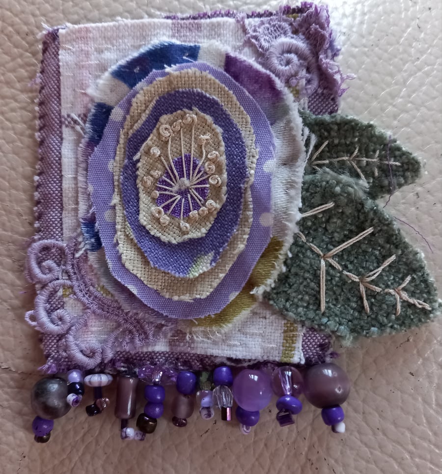 The scrappy purple flower brooch