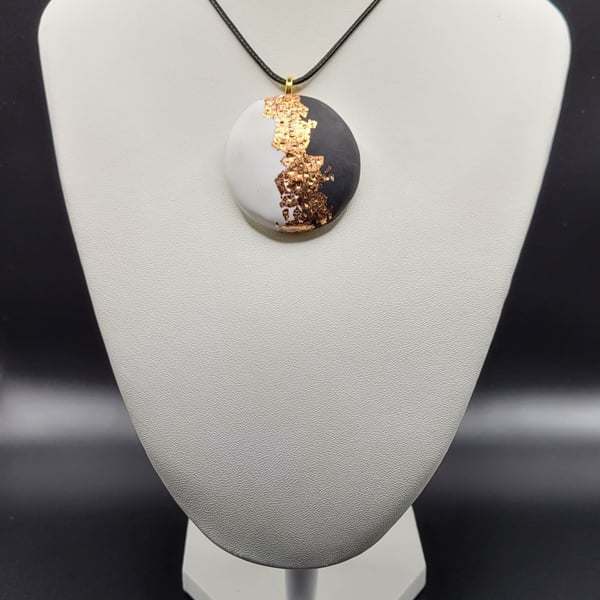 Black and white circular polymer clay pendant with gold leaf handmade statement 