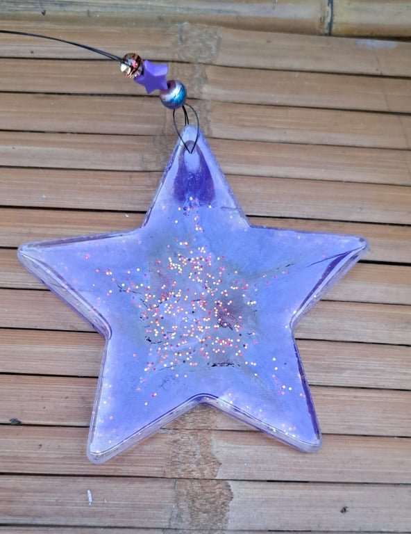 Lovely hanging purple glitter resin star