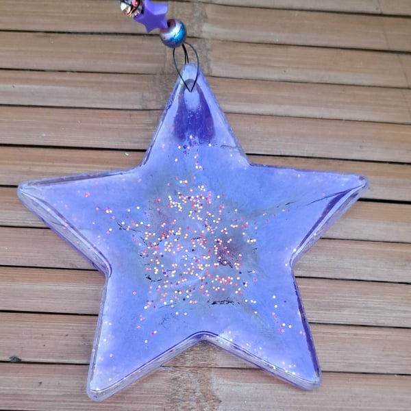 Lovely hanging purple glitter resin star