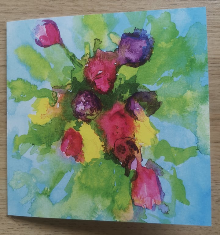 An explosion of tulips greetings card